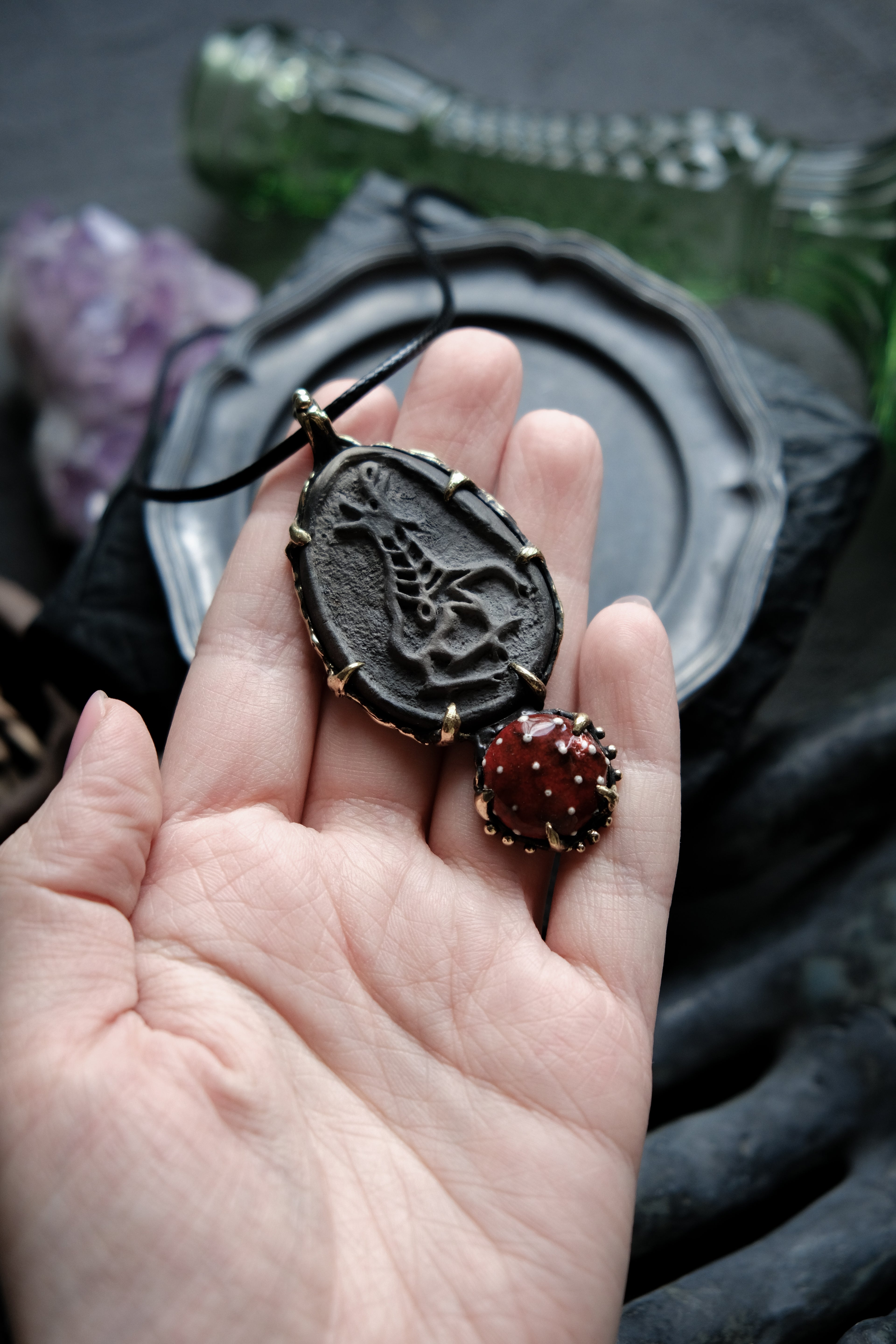 Brass pendant with ceramic cabochons
