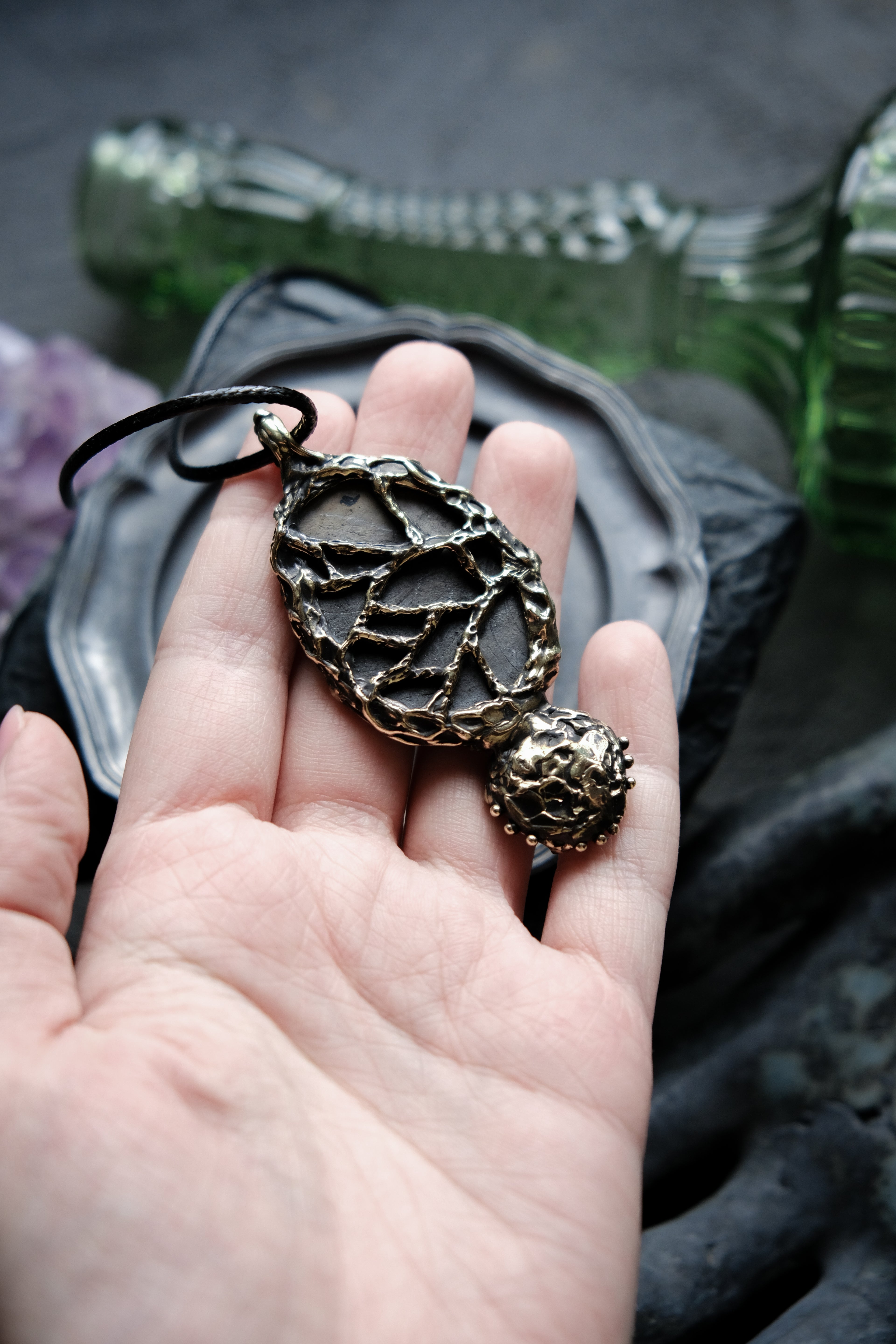 Brass pendant with ceramic cabochons