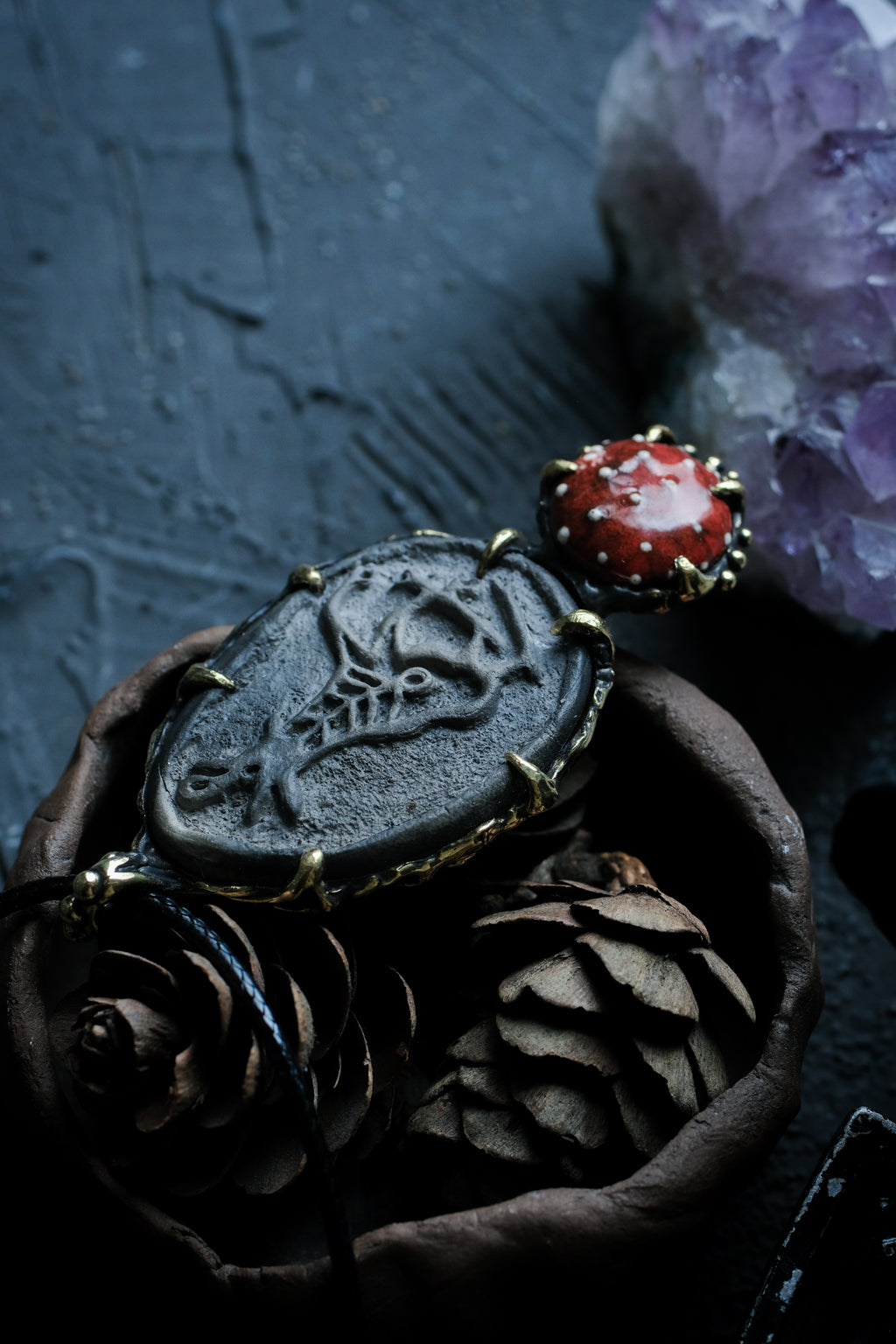 Brass pendant with ceramic cabochons
