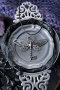 Winged key pendant