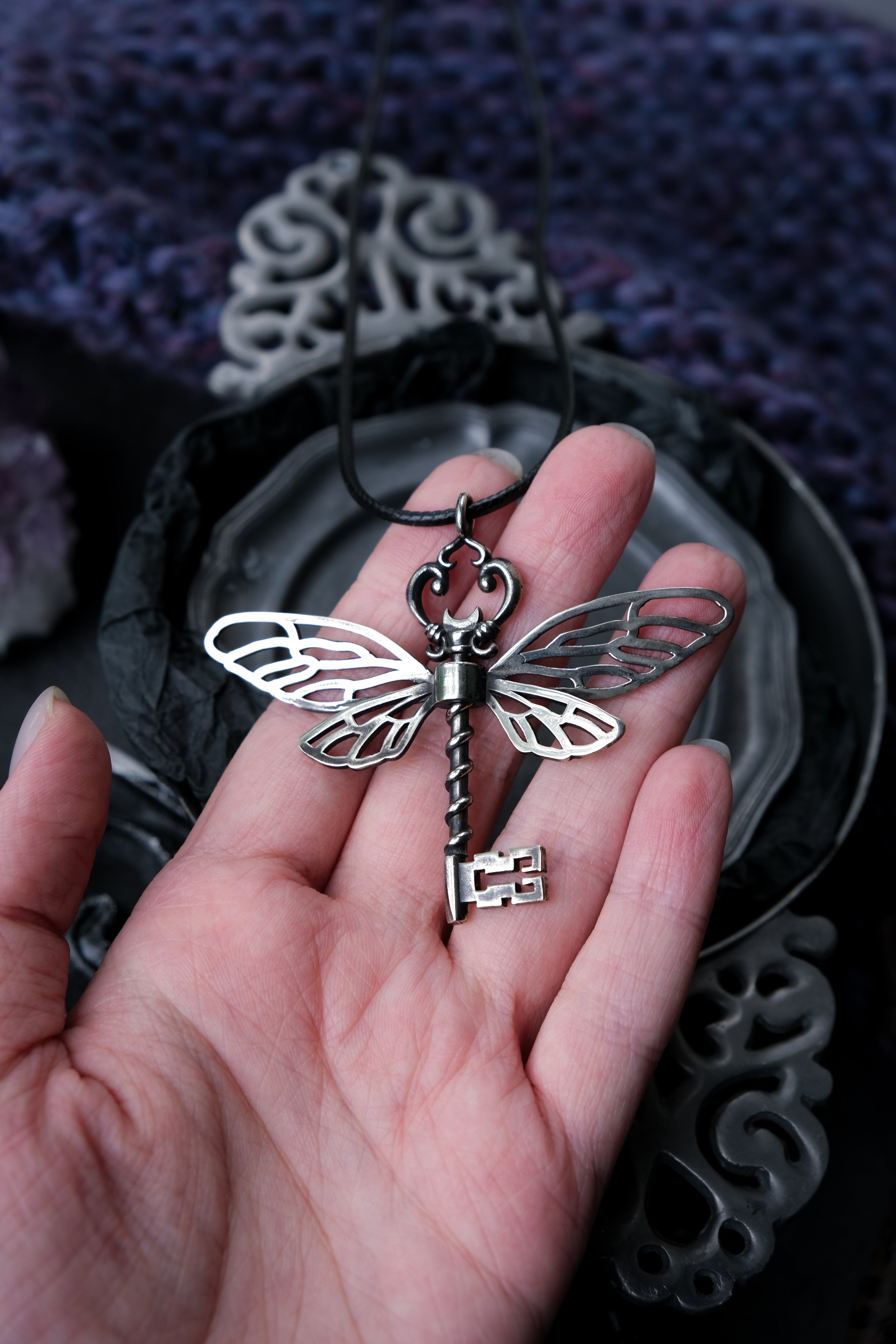 Winged key pendant
