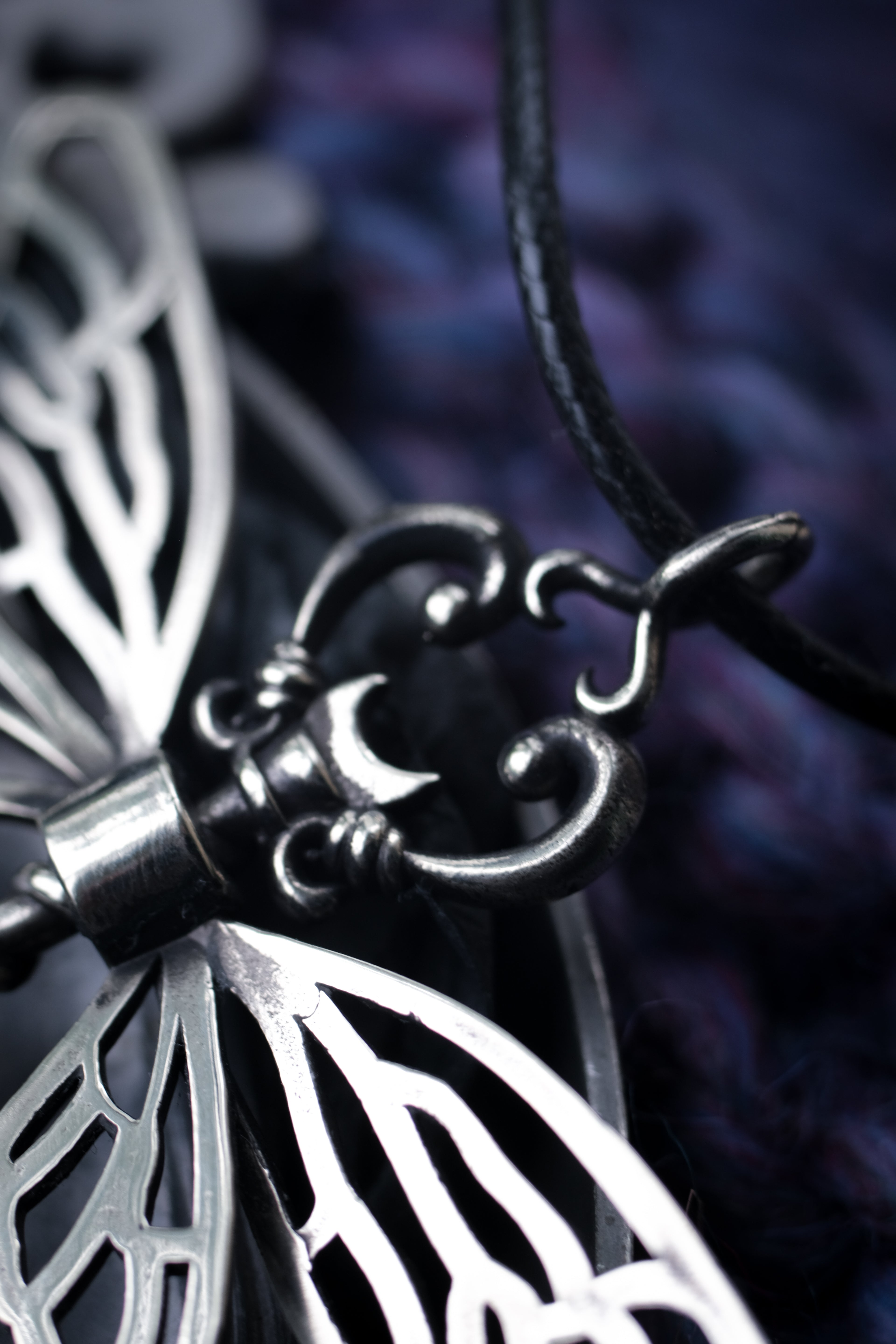 Winged key pendant