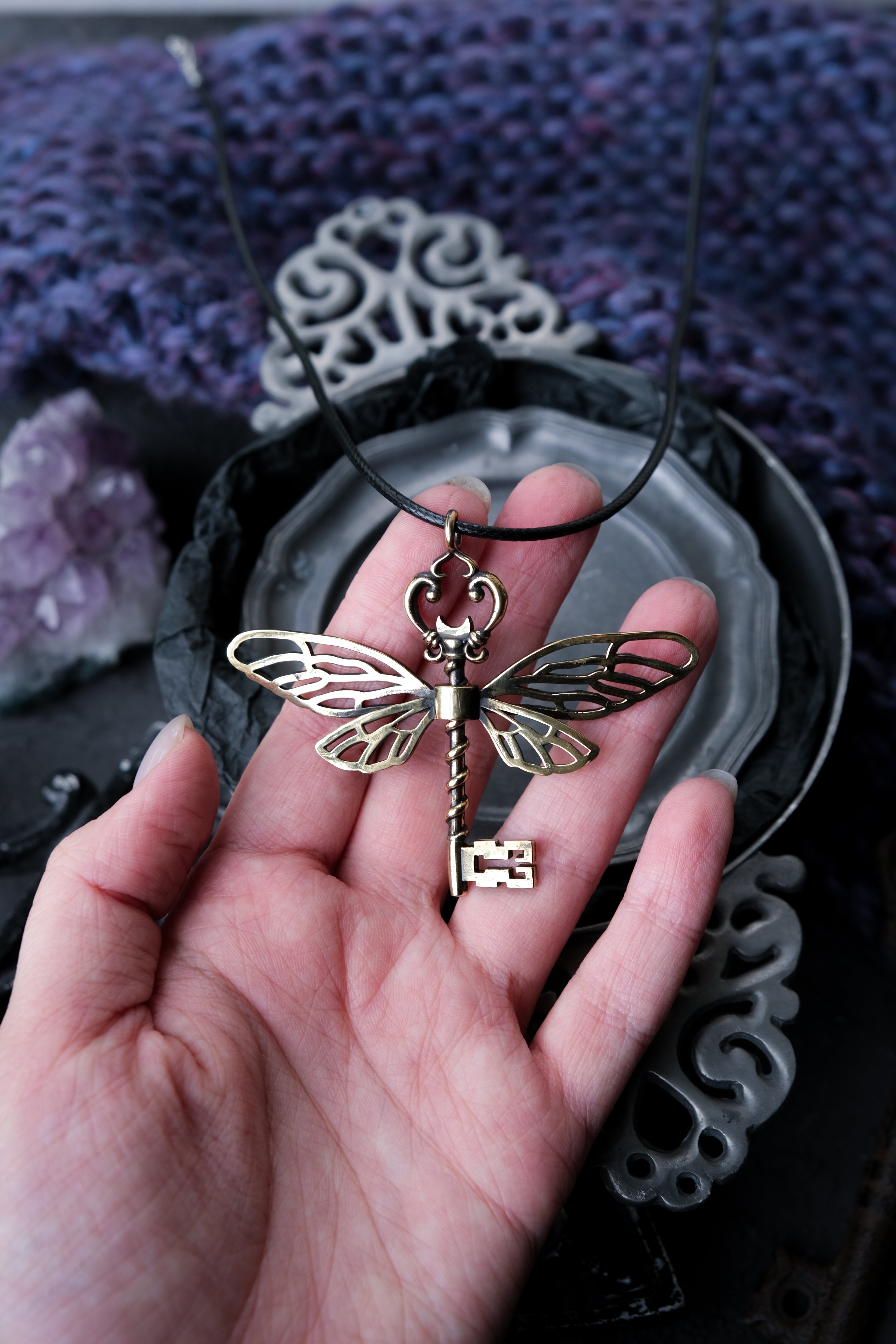 Winged key pendant