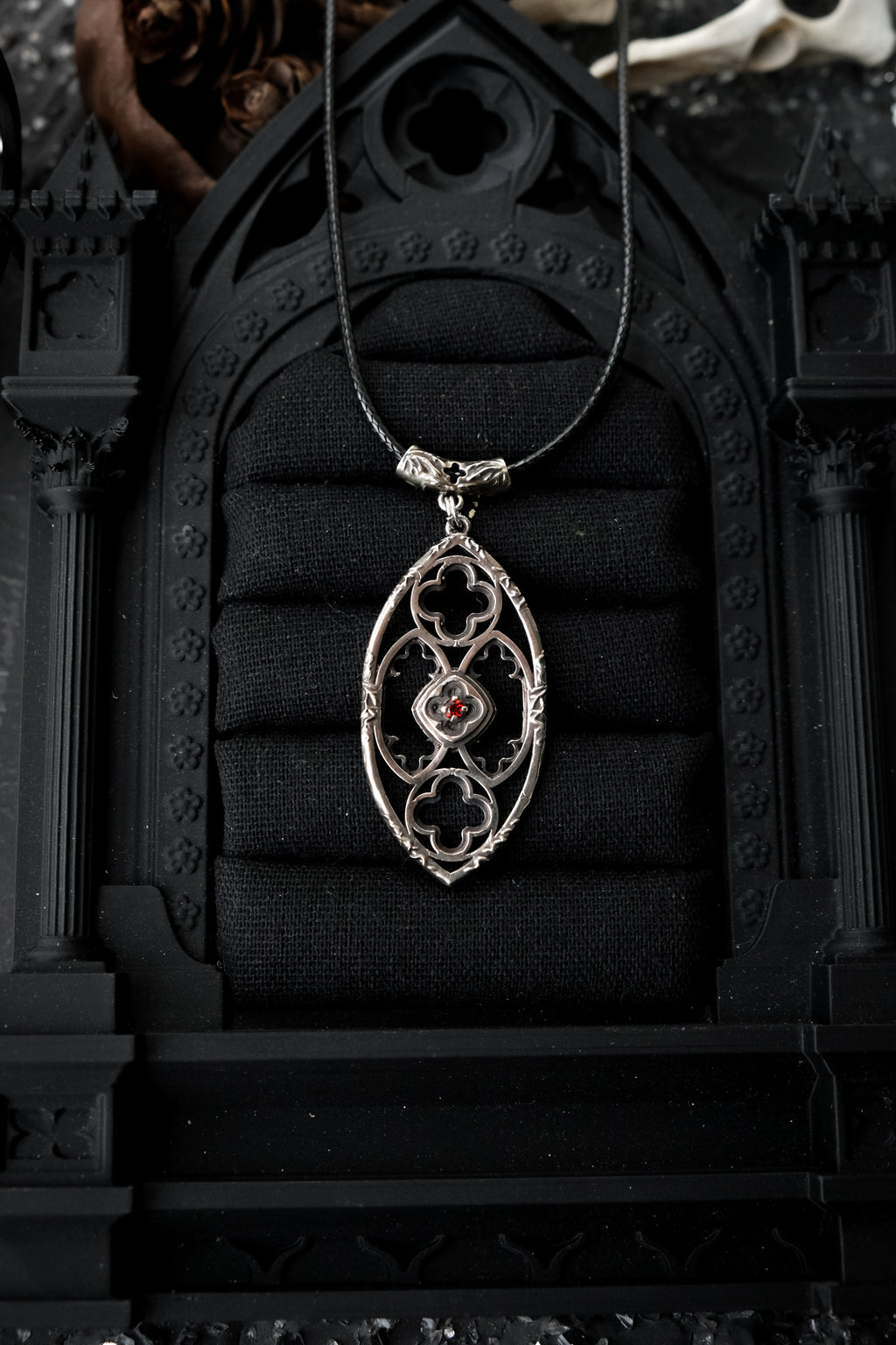 Gothic window pendant with garnet