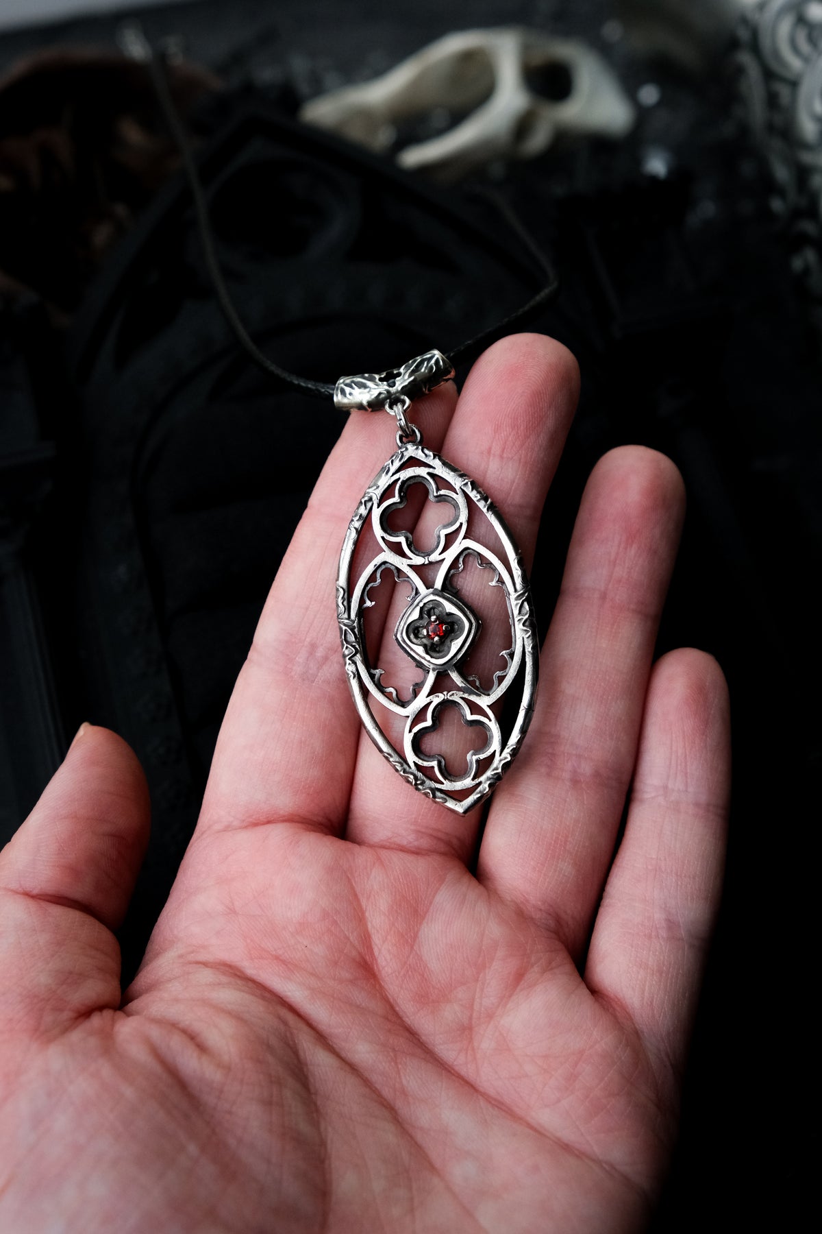 Gothic window pendant with garnet