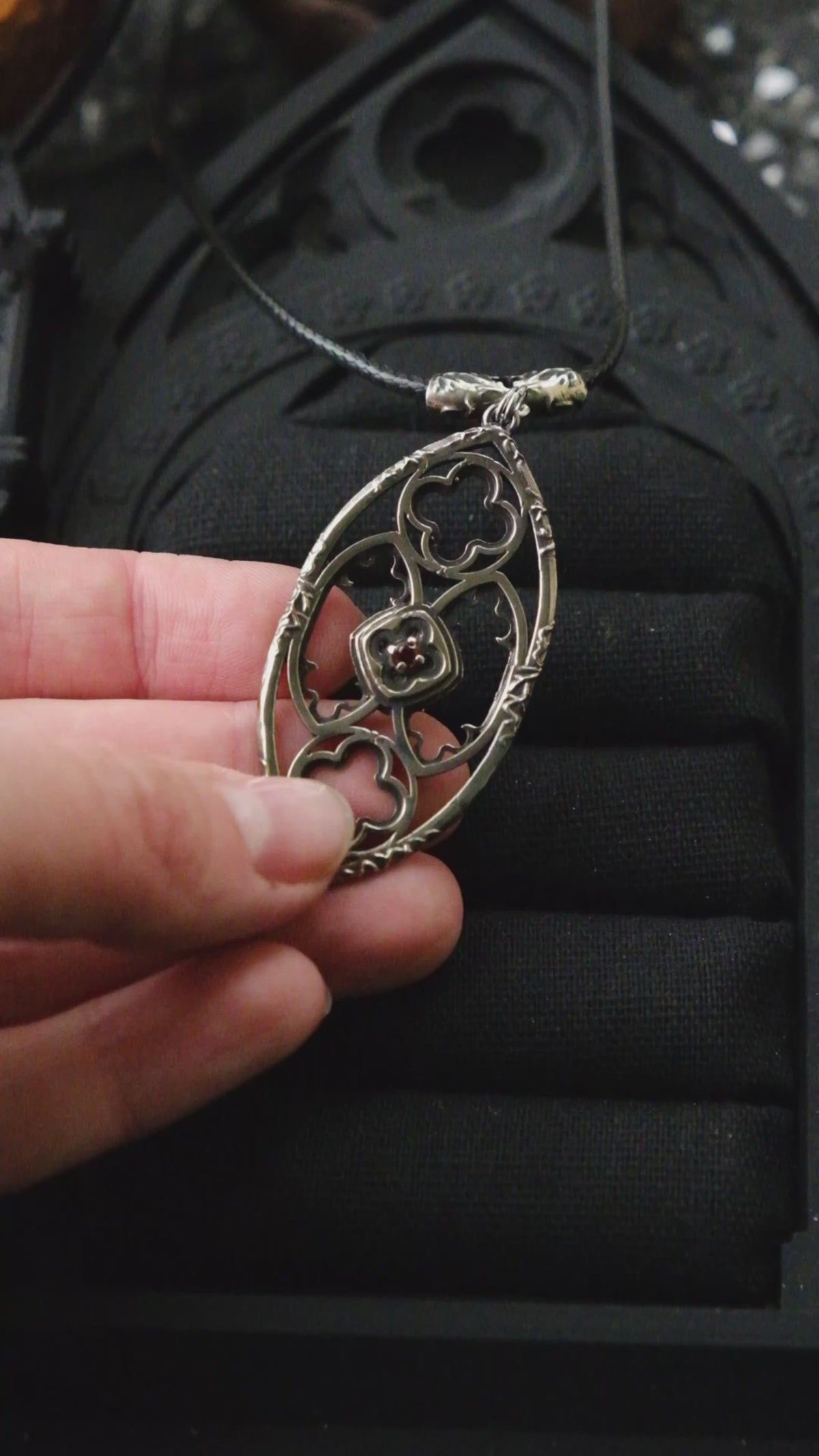 Gothic window pendant with garnet