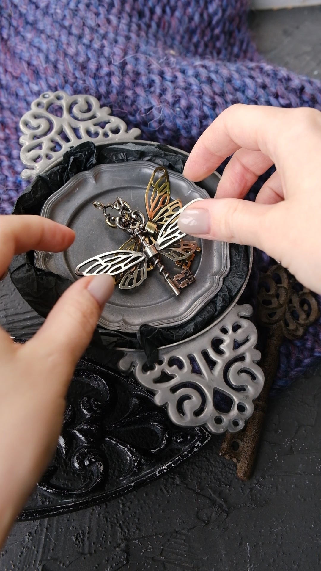 Winged key pendant